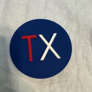 Blue Circle with Red and White TX Logo